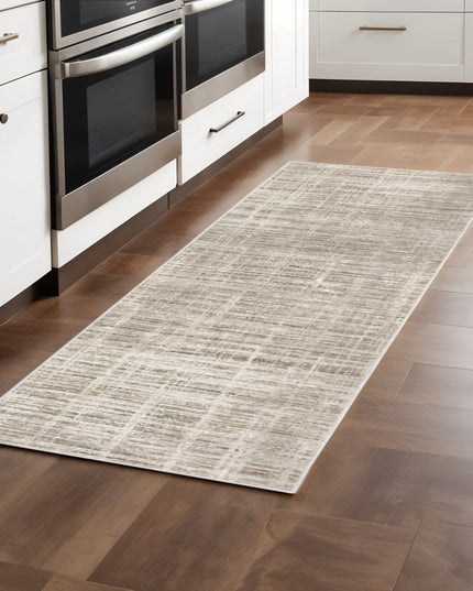 2' X 8' Beige Grey Ivory Tan And Brown Abstract Power Loom Stain