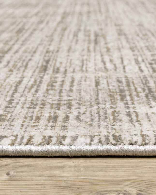 2' X 8' Beige Grey Ivory Tan And Brown Abstract Power Loom Stain