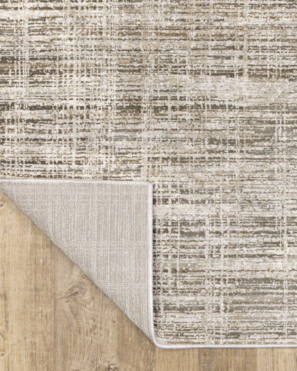 2' X 8' Beige Grey Ivory Tan And Brown Abstract Power Loom Stain