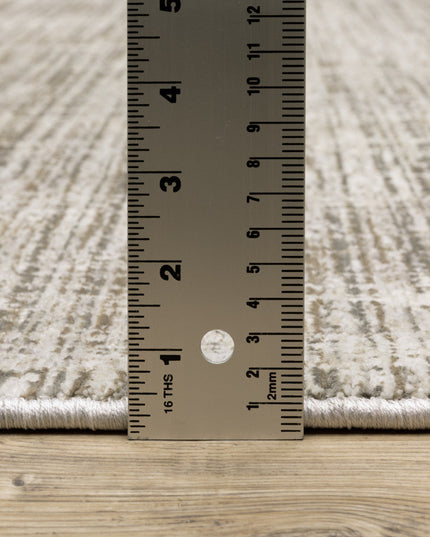 2' X 8' Beige Grey Ivory Tan And Brown Abstract Power Loom Stain