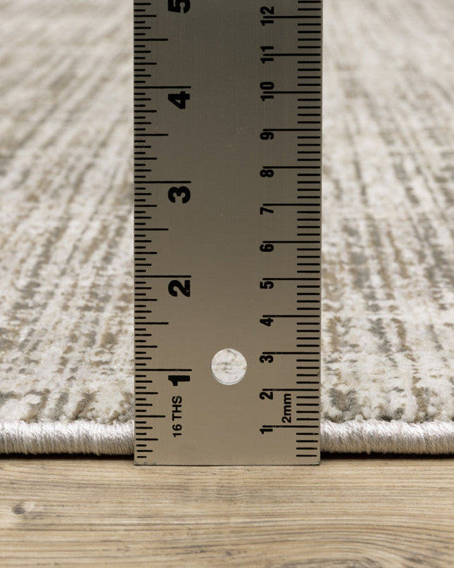 2' X 8' Beige Grey Ivory Tan And Brown Abstract Power Loom Stain