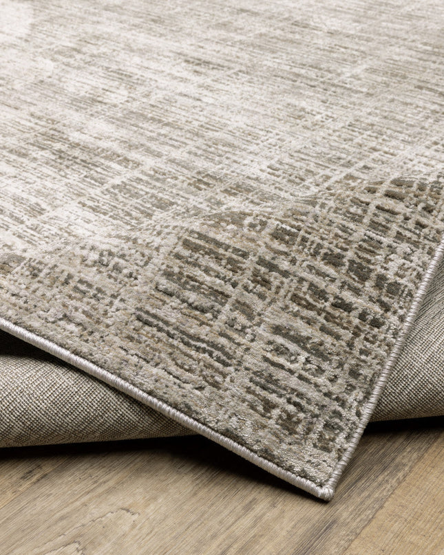 2' X 8' Beige Grey Ivory Tan And Brown Abstract Power Loom Stain